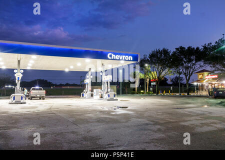Stuart Florida,night,Chevron,gas petrol filling fueling station,pumps,canopy,FL170925235 Stock Photo
