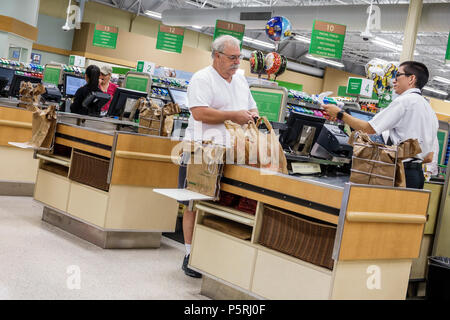 Stuart Florida,Publix grocery store supermarket food,interior inside,cashier,senior seniors old citizen citizens pensioner pensioners retired elderly, Stock Photo