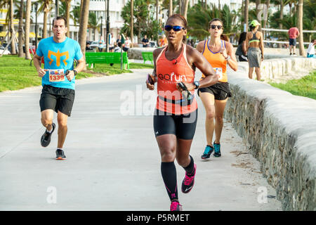 Miami Beach Florida,Ocean Drive,Lummus Park,Burger King 5K Beach Run,fundraiser corporate sponsor,Black Blacks African Africans ethnic minority,adult Stock Photo