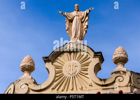 Statue of Jesus at the top of the church in Nadur, Gozo, Malta. Stock Photo