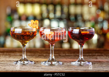 Summer cocktail menu. Cocktails stand in a row on the bar, space for text  Stock Photo - Alamy