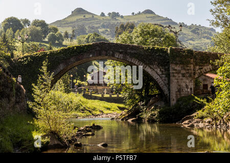 Lierganes, Cantabria. Views of the Puente Romano Viejo (Old Roman Bridge) and the Tetas de Lierganes twin mountains. One of the most beautiful towns i Stock Photo