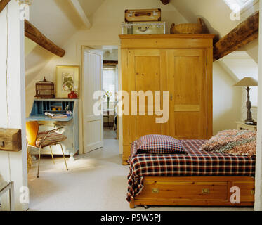 Large Old Pine Wardrobe In Stable Conversion Bedroom With Checked