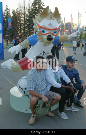 St. Petersburg, Russia - June 26, 2018: Football fans make photo at Zabivaka official mascot near Saint Petersburg stadium during FIFA World Cup Russi Stock Photo