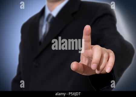 Business man touching imaginary screen Stock Photo