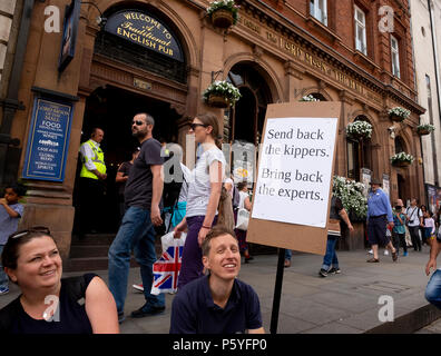 London, UK. 23rd June 2018. A statement outside Wetherspoons pub on Whitehall as the anti-Brexit  March for a Peoples Vote passes by.  Credit: Scott H Stock Photo