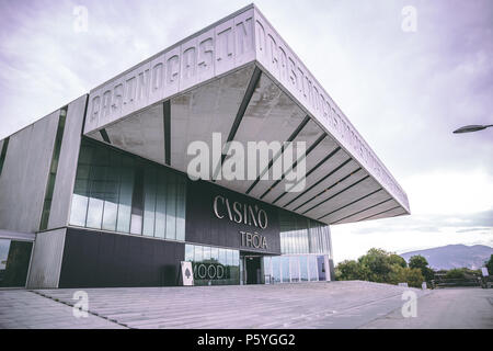 June 20th, 2018, Troia, Portugal - the Troia Casino, a contemporary casino with gaming tables, slot machines, a stage & bar at an upscale hotel. Stock Photo