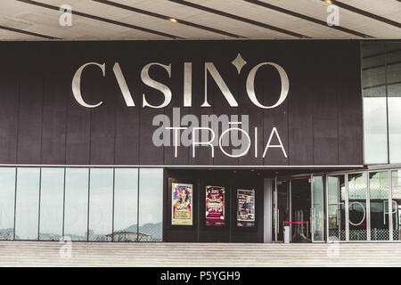 June 20th, 2018, Troia, Portugal - the Troia Casino, a contemporary casino with gaming tables, slot machines, a stage & bar at an upscale hotel. Stock Photo