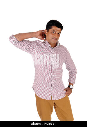 A handsome middle age man standing in a red checkered shirt with his  hand behind his head, looking at camera, isolated for white background Stock Photo