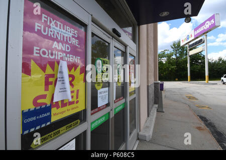 Liquidation signs on a Toys R Us building in Manchester, N.H., USA, during its going-out-of-business sale, June 25, 2018. Stock Photo