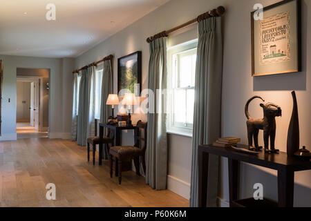 Lit lamps in hallway Stock Photo
