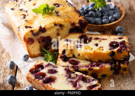 Freshly baked blueberry muffin bread close-up on a table. horizontal