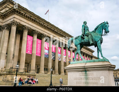 St George's Hall, with Liverpool name on large pink banners and statue of Prince Albert Prince Consort on a horse, Liverpool, England, UK Stock Photo