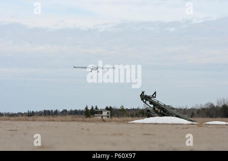 The RQ-7B (Shadow) begins its assent as it is launched by the Soldiers of 2nd Cavalry Regiment, Engineer Squadron, stationed out of Vilseck, Germany, during a test flight at Tapa Training Area, Estonia, April 5, 2016. (Photo by U.S. Army Staff Sgt. Steven M. Colvin/Released) Stock Photo