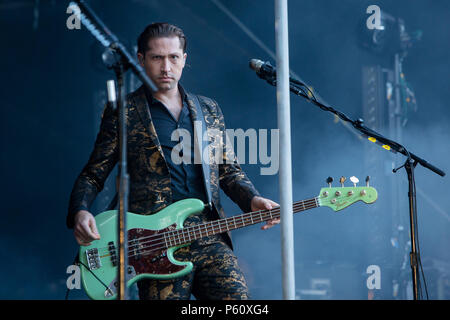 Norway, Bergen - June 12, 2018. The American rock band Queens of the Stone Age performs a live concert during the Norwegian music festival Bergenfest 2018 in Bergen. Here bass player Michael Shuman is seen live on stage. (Photo credit: Gonzales Photo - Jarle H. Moe). Stock Photo