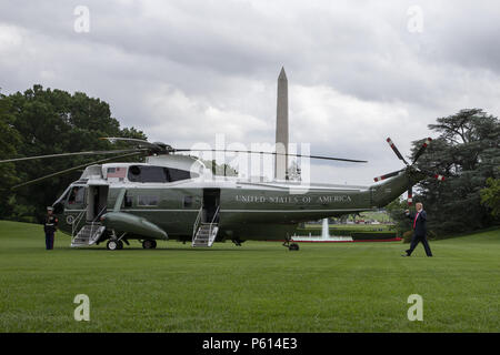 Washington, District of Columbia, USA. 27th June, 2018. United States President Donald Trump boards Marine One as he departs the White House on June 27, 2018 in Washington, DC. Credit: Alex Edelman/CNP Credit: Alex Edelman/CNP/ZUMA Wire/Alamy Live News Stock Photo