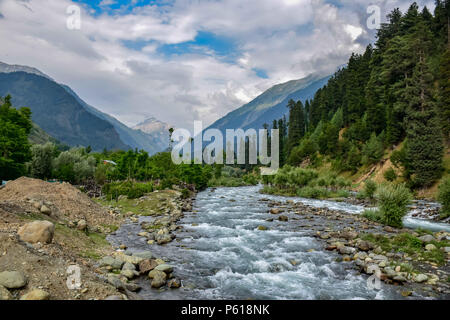 June 24, 2018 - Ananthnag, Jammu & Kashmir, India - View of Pahalgam along with the river lidder flowing in the middle on a sunny day.Pahalgam is a hill station in the Ananthnag District of Jammu and Kashmir some 98 Kms from srinagar summer capital of Indian administered Kashmir. Pahalgam Is located on the bank of Lidder River at an altitude of 7200 feets. Pahalgam is associated with an annual Amarnath Yatra which takes place every year in July ''” August. Credit: Abbas Idrees/SOPA Images/ZUMA Wire/Alamy Live News Stock Photo