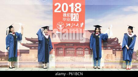 Hangzhou, China's Zhejiang Province. 28th June, 2018. Graduating students pose for photos at Zhejiang University in Hangzhou, east China's Zhejiang Province, June 28, 2018. Credit: Long Wei/Xinhua/Alamy Live News Stock Photo
