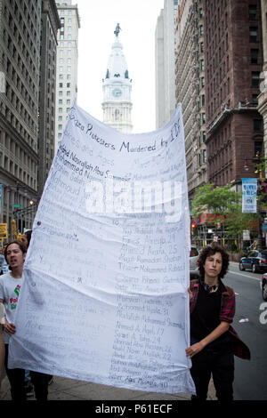 Philadelphia, USA, 14th May, 2018. Pro-Palestinan groups protest the decision of the US goverment to move its embassy in Israel to the city of Jerusalem. The move  comes after weeks of Palestinan protests at the Israeli border with the Gaza Strip during which Israeli forces have fired on and killed dozens of Palestinans. Stock Photo