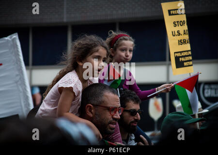 Philadelphia, USA, 14th May, 2018. Pro-Palestinan groups protest the decision of the US goverment to move its embassy in Israel to the city of Jerusalem. The move  comes after weeks of Palestinan protests at the Israeli border with the Gaza Strip during which Israeli forces have fired on and killed dozens of Palestinans. Stock Photo