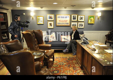 NEWPORT NEWS, Va. (Apr 07, 2016) -- Susan Ford Bales, ship sponsor, talks about her hand-sewn pillow found in Pre-Commissioning Unit Gerald R. Ford’s (CVN 78) inport cabin. Bales made the pillow out of wool so that it would last the entirety of the ship's lifespan. (U.S. Navy photo by Mass Communication Specialist Seaman Apprentice Connor Loessin/Released) Stock Photo