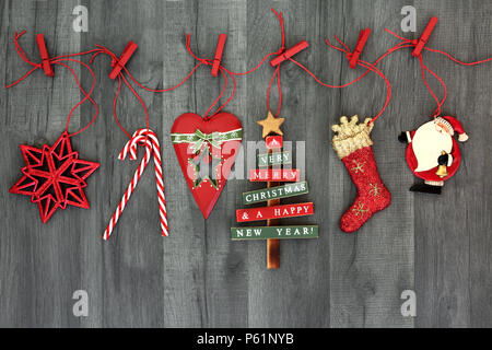 Christmas Decorations With Wooden Pegs On A Line Stock Photo