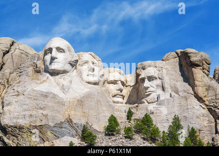 Presidential sculpture at Mount Rushmore national memorial, USA. Sunny day, blue sky. Stock Photo