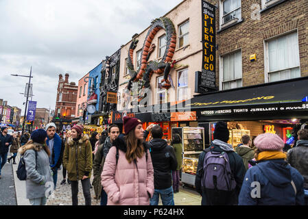 London, England UK  - December 31, 2017: People walking down the fashion shops of Camden High Street in Camden Lock or Camden Town in London, England, Stock Photo