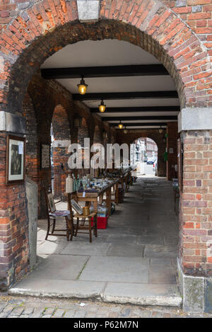 A small antiques market in the historic market hall, Amersham Old Town, Buckinghamshire, England, UK Stock Photo