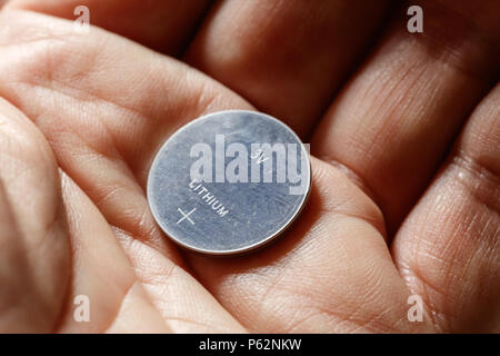 Silver Button Cell Battery On White Background Stock Photo