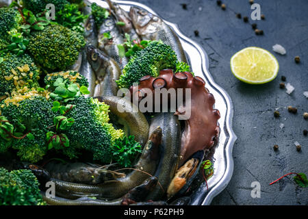 Close view of fresh seafood. Fish, shrimp, octopus and mussels. Stock Photo