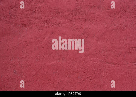 cemented wall painted red background. texture. Stock Photo
