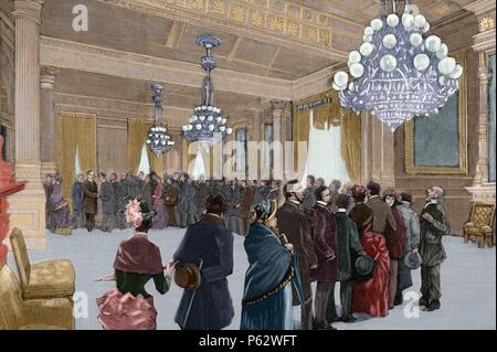 Grover Cleveland (1837-1908). President of the United States. Washington. A public reception day by President Cleveland in the East Room of the White House. Engraving in The Spanish and American Illustration, 1886. Colored. Stock Photo