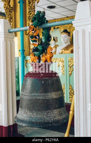 Yangon, Myanmar - FEB 19th 2014: Bell in golden buddha temple at Shwedagon Pagoda Stock Photo