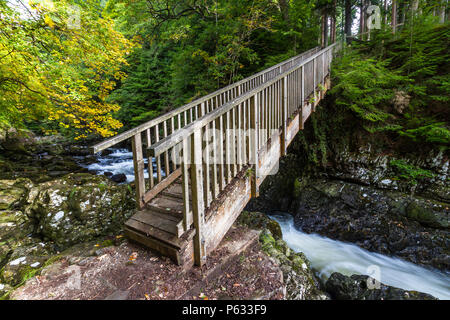 Wooden Miners bridge over the Afon Lledr, in Betws-y-Coed, Gwynedd, North Wales, UK Stock Photo