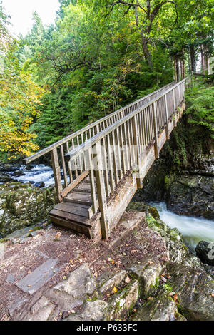Wooden Miners bridge over the Afon Lledr, in Betws-y-Coed, Gwynedd, North Wales, UK Stock Photo