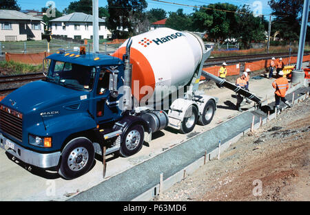 Concreting a services channel alongside the widened track space for the Ipswich to Brisbane rail upgrade project at Barra, Queensland, Australia Stock Photo