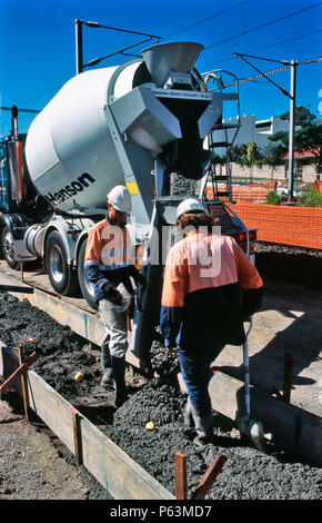 Concreting a services channel alongside the widened track space for the Ipswich to Brisbane rail upgrade project at Barra, Queensland, Australia Stock Photo