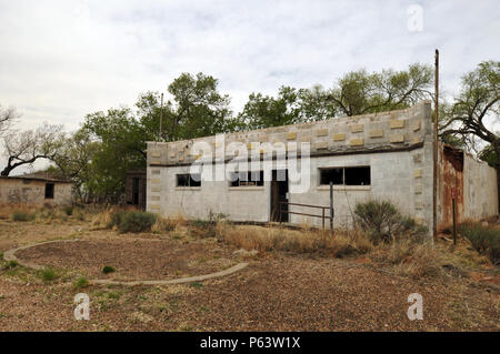An abandoned commercial building in the Route 66 ghost town of Glenrio on the Texas-New Mexico border. Interstate 40 bypassed Glenrio in the 1970s. Stock Photo