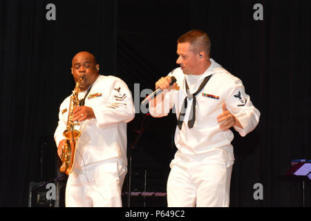 SPRING BRANCH, Texas – (April 20, 2016) Saxophonist and Stamps, Ark. native, Musician 1st Class Dexter Jones, and Detroit native, Musician 3rd Class Carl Schulte of “Pride”, the popular music group of Navy Band Southeast from Jacksonville, Fla., performs for students of Smithson Valley High School during San Antonio Navy Week. “Pride”, along with Sailors from Navy Recruiting District San Antonio and Navy Office of Community Outreach (NAVCO), visited the school to conduct community outreach and spread Navy Awareness.  Navy Weeks, coordinated by NAVCO, are designed to give Americans the opportun Stock Photo