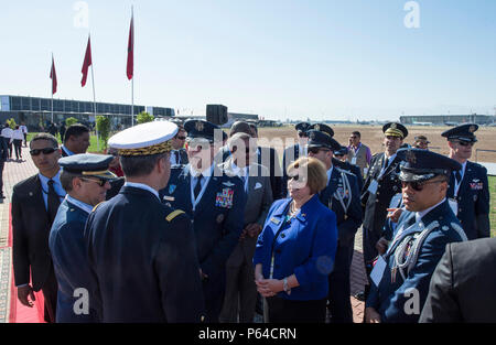 Mrs. Heidi Grant (center right), the Deputy Under Secretary of the Air Force of International Affairs, and U.S. Air Force General Frank Gorenc (center left), Commander of U.S. Air Forces in Europe – U.S. Air Forces Africa, speak with other distinguished visitors during the opening day ceremony of the International Marrakech Airshow in Morocco on Apr. 27, 2016. Several U.S. independent and government owned aircraft were displayed at the expo in an effort to demonstrate their capabilities to a broad audience of individuals from approximately 54 other countries. (DoD News photo by TSgt Brian Kimb Stock Photo