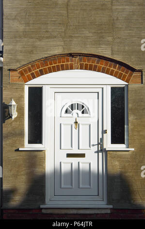 Facade repair on residential dwellings after pebble dash has been removed Stock Photo