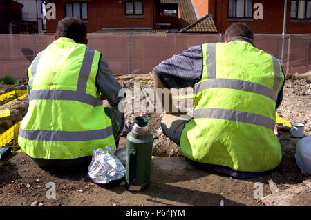 Builders having a tea break Stock Photo