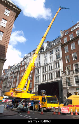 Mobile crane blocking off a street, London Stock Photo