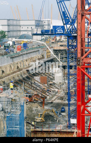 Pumping concrete into foundations of large scale construction site, Canary Wharf, London Stock Photo