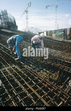 Fixing steel reinforcement for in situ concrete structure. Dense reinforcement installed in dry dock for foot of bridge piers on the Rion-Antirion bri Stock Photo