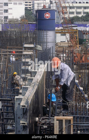 Fixing steel reinforcement for a water treatment plant in Bangkok Thailand. Stock Photo