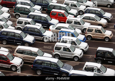 New Suzuki cars and vans parked at Avonmouth docks near Bristol, UK Stock Photo