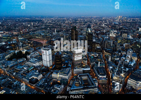 Aerial view of City of London skyline at night, UK Stock Photo