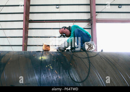 Workers at Hyojong Pipe factory, Doha. Stock Photo